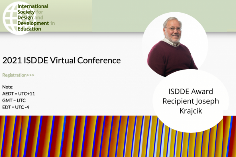 ISDDE logo, conference information, and photo of Joe Krajcik